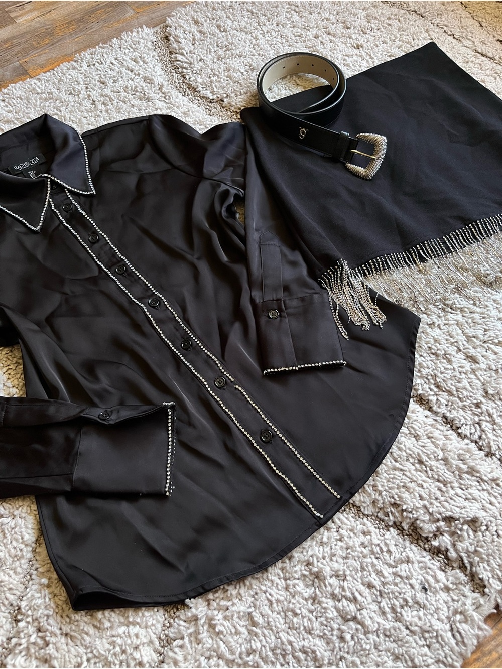Black top and skirt with rhinestone and belt